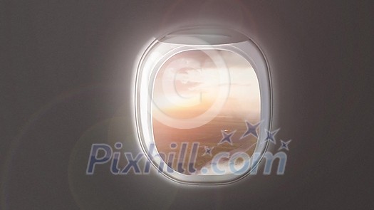 Panoramic aerial video of countryside rural landscape with green fields and forests on a background of cloudy sunset sky from porthole inside airplane. 4K UHD video 3840, 2160p. Panoramic aerial video of countryside rural landscape with green fields and forests on a background of cloudy sunset sky from porthole inside airplane. 4K UHD video 3840, 2160p.