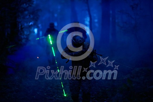 soldiers squad in action on night mission using laser sight beam lights military team concept soldiers squad in action on night mission using laser sight beam lights military team concept