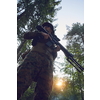soldier portrait with  protective army tactical gear  and weapon having a break and relaxing