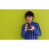 enthusuast arab teen photographer with analog slr camera on pink packground