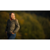 Portrait of a pretty middle-aged  woman outside in a park, portrait with lots of copy space