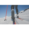 Cross-country skiing: young woman cross-country skiing on a winter day (motion blurred image)