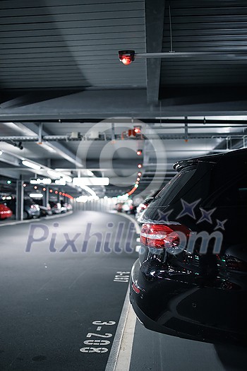 Underground garage or modern car parking with lots of vehicles Underground garage or modern car parking with lots of vehicles