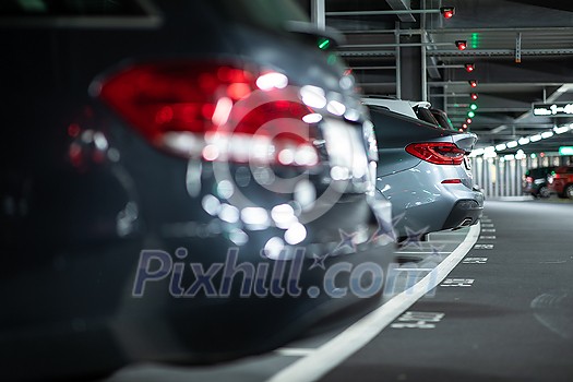 Underground garage or modern car parking with lots of vehicles Underground garage or modern car parking with lots of vehicles