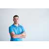 portrait of casual startup businessman wearing a blue T-shirt isolated on white background