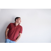 portrait of casual startup businessman wearing a red T-shirt isolated on white background
