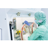 Virus antidote being prepared in a biochem lab with extremely strict precautionary measures (shallow DOF; color toned image)
