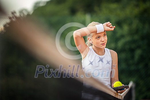 Portrait of a young, female tennis player Portrait of a young, female tennis player
