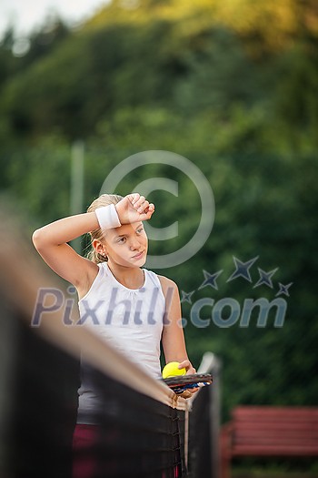 Portrait of a young, female tennis player Portrait of a young, female tennis player