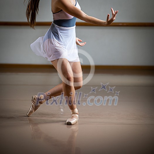 Legs and slippers of classical ballet dancers rehearsing Legs and slippers of classical ballet dancers rehearsing