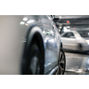Underground garage or modern car parking with lots of vehicles, perspective