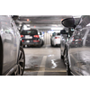 Underground garage or modern car parking with lots of vehicles, perspective