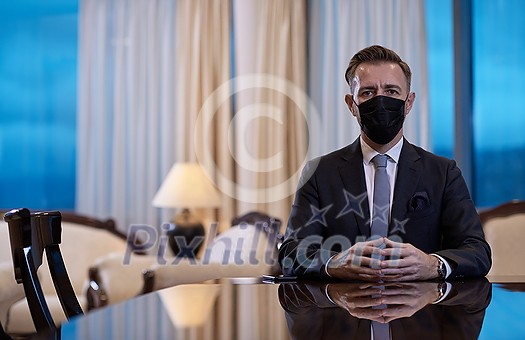 corporate business man wearing protective medical face mask at luxury office corporate business man wearing protective medical face mask at luxury office