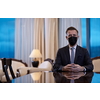 corporate business man wearing protective medical face mask at luxury office