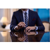 corporate businessman holding  pen and gesturing with hands concpet of business deal
