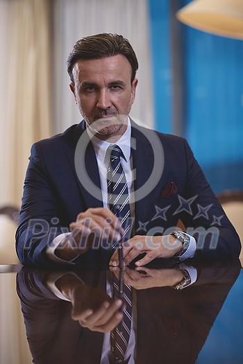 corporate businessman holding pen and gesturing with hands concpet of business deal corporate businessman holding pen and gesturing with hands concpet of business deal