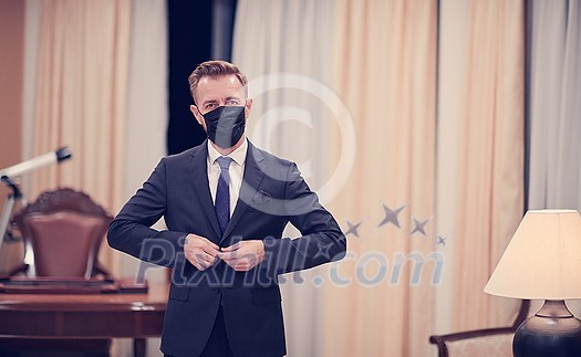 corporate business man wearing protective medical face mask at luxury office corporate business man wearing protective medical face mask at luxury office