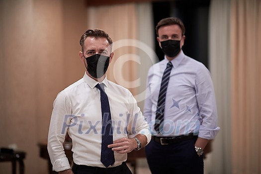 corporate business team wearing crona virus protection face mask keep social distance in luxury office corporate business team wearing crona virus protection face mask keep social distance in luxury office