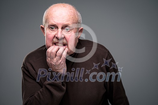 Senior man lonely at home, anxious/afraid to go out - self isolation/ quarantine due to COVID-19/ Coronavirus social distancing/prevention concept Senior man lonely at home, anxious/afraid to go out - self isolation/ quarantine due to COVID-19/ Coronavirus social distancing/prevention concept