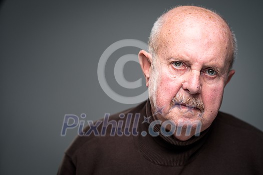Senior man lonely at home, anxious/afraid to go out - self isolation/ quarantine due to COVID-19/ Coronavirus social distancing/prevention concept Senior man lonely at home, anxious/afraid to go out - self isolation/ quarantine due to COVID-19/ Coronavirus social distancing/prevention concept