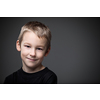 Grief-stricken little boy - feeling intense sorrow, remorse, sadnesss - studio portrait - vivid emotions series