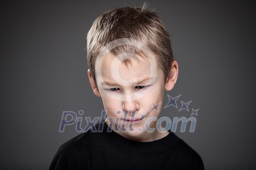 Grief-stricken little boy - feeling intense sorrow, remorse, sadnesss - studio portrait - vivid emotions series Grief-stricken little boy - feeling intense sorrow, remorse, sadnesss - studio portrait - vivid emotions series
