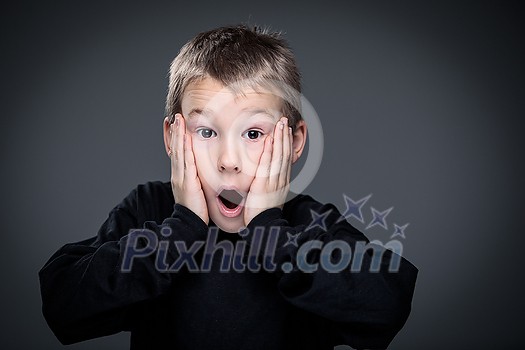 Grief-stricken little boy - feeling intense sorrow, remorse, sadnesss - studio portrait - vivid emotions series Grief-stricken little boy - feeling intense sorrow, remorse, sadnesss - studio portrait - vivid emotions series