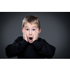 Grief-stricken little boy - feeling intense sorrow, remorse, sadnesss - studio portrait - vivid emotions series