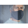 Senior man wearing  a facemask during coronavirus and flu outbreak. Virus and illness protection, home quarantine. COVID-19 concept