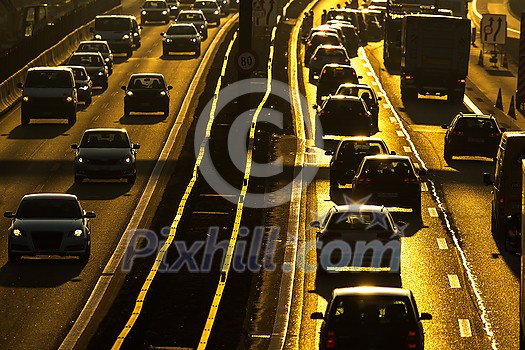Heavy morning city traffic/congestion concept - cars going very slowly in a traffic jam during the morning rushhour Heavy morning city traffic/congestion concept - cars going very slowly in a traffic jam during the morning rushhour