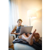 Pretty, young woman working from home during a pandemic coronavirus crisis