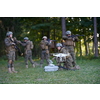 Modern Warfare Soldiers Squad are Using Drone for Scouting and Surveillance During Military Operation in the Forest.