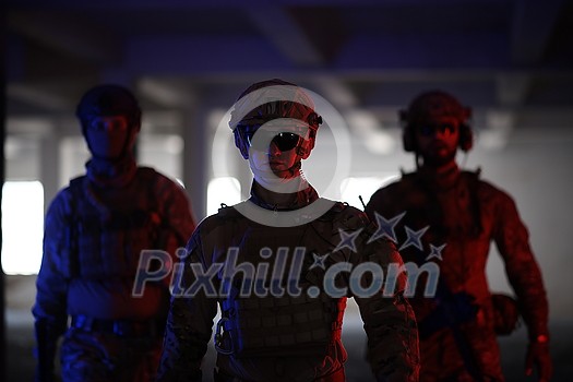 soldier squad team walking in urban environment colored neon lights soldier squad team walking in urban environment colored neon lights