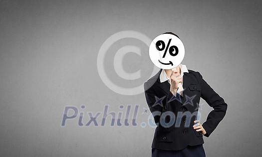 Unrecognizable businesswoman hiding her face behind mask Unrecognizable businesswoman hiding her face behind mask