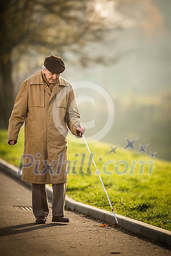 Blind man crossing a street Blind man crossing a street