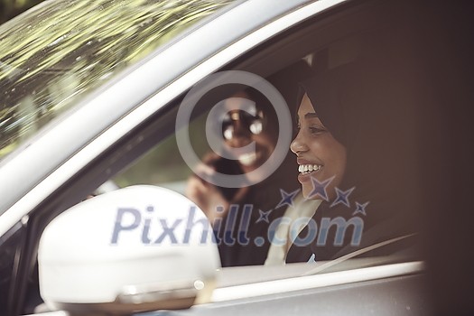 Arabic Woman Couple Traveling By Luxury Car in Saudy Arabia Arabic Woman Couple Traveling By Luxury Car in Saudy Arabia