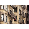 Old apartment building with fire escapes, Manhattan, New York City