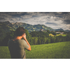 Photographer taking photos of the splendid medieval village of Gruyres, Switzerland
