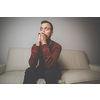 Handsome young man feeling thankful - praying to God - Gratitude concept (color toned image with added grain)