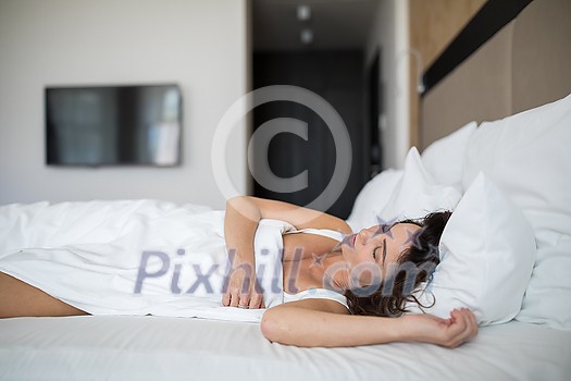 Beautiful young woman sleeping in bed Beautiful young woman sleeping in bed