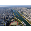 Eiffel Tower in Paris against a dramatic blue sky at day tourist and travel attraction