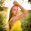 Portrait of young  woman with radiant clean outdoor on a spring/summer sunny day