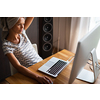 Home office/Remote work series - Pretty, young woman working at her computer from home