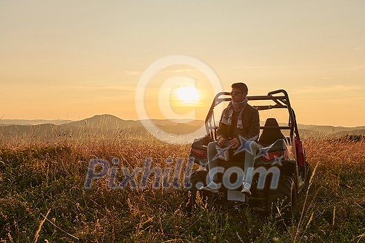 portrait of young happy excited man enjoying beautiful sunny day while driving a off road buggy car on mountain nature portrait of young happy excited man enjoying beautiful sunny day while driving a off road buggy car on mountain nature