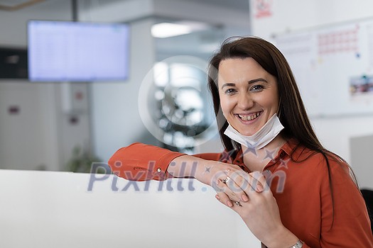 business woman portrait wearing medical mask in bright modern office new normal coronavirus outbreak concept real people business woman portrait wearing medical mask in bright modern office new normal coronavirus outbreak concept real people