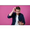 a portrait of a young man wearing a blue shirt and sunglasses using a smartphone with different facial expressions
