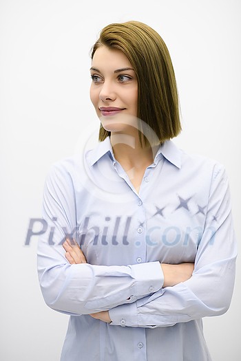 Portrati shot of beautiful blond businesswoman standing with arms crossed at isolated white background. Copy space.
Portrati shot of beautiful blond businesswoman standing with arms crossed at isolated white background. Copy space.