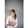 Confident young woman in casual clothing with copy space. Successful smiling woman