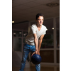 Young man at the bowling alley with the ball