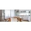 Modern Kitchen Interior Design Architecture Stock Image, Photo of a modern white kitchen with a dark wood table, hi-end appliances and plenty of daylight